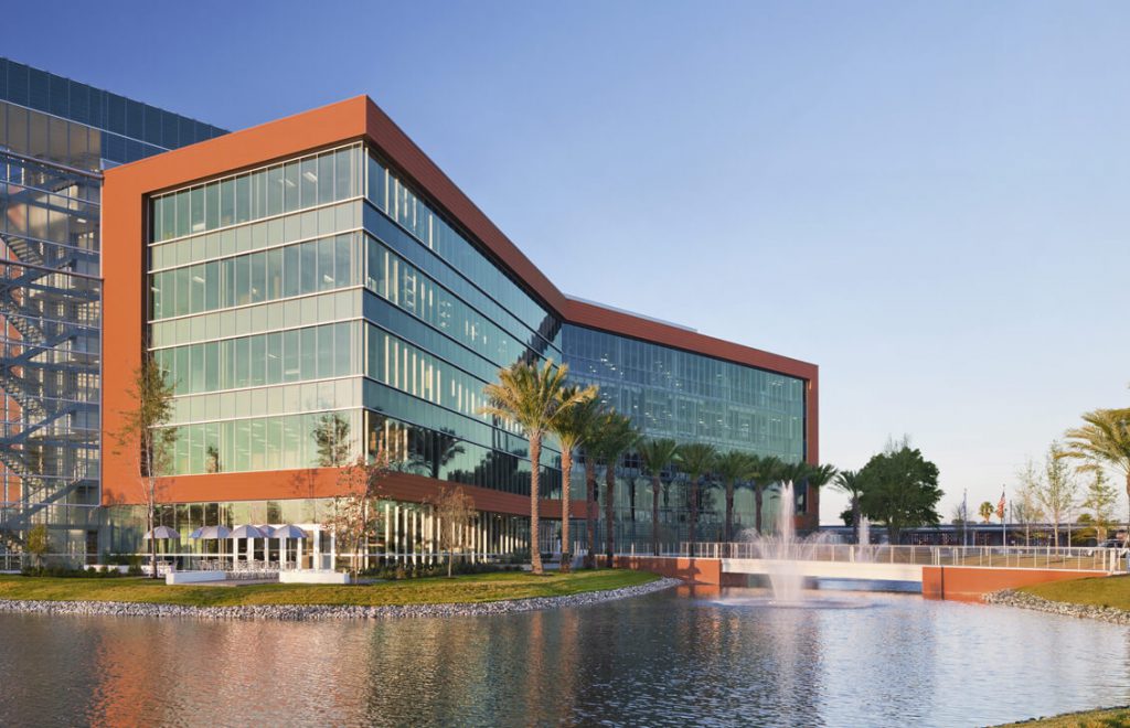 Photograph of building with water feature
