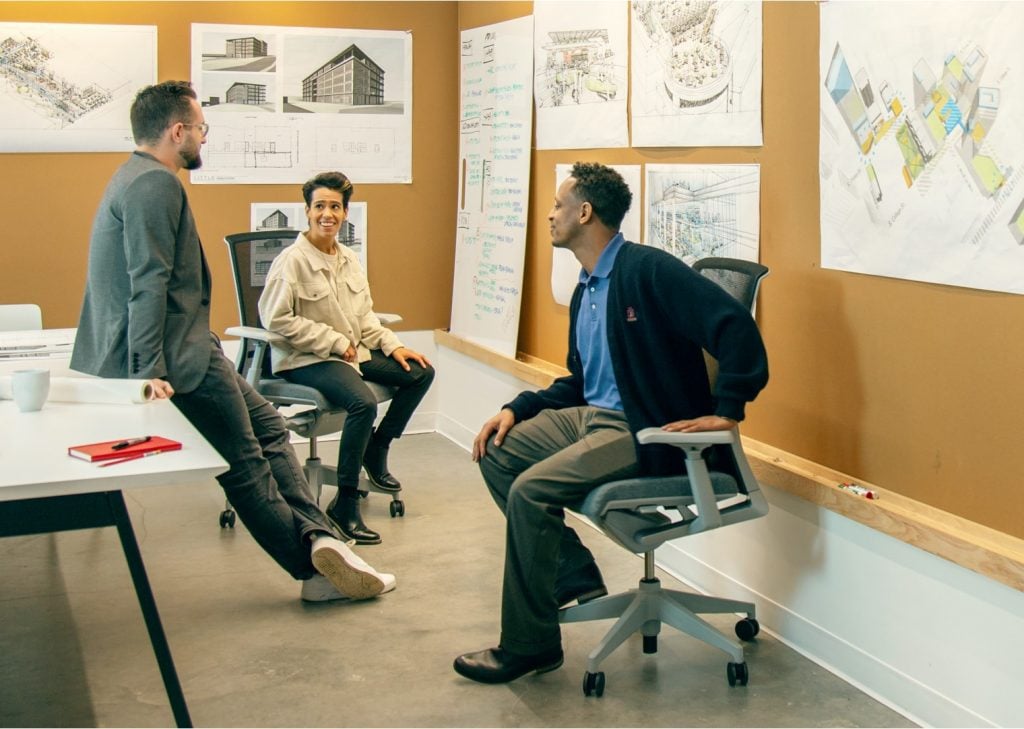 Photograph of people meeting