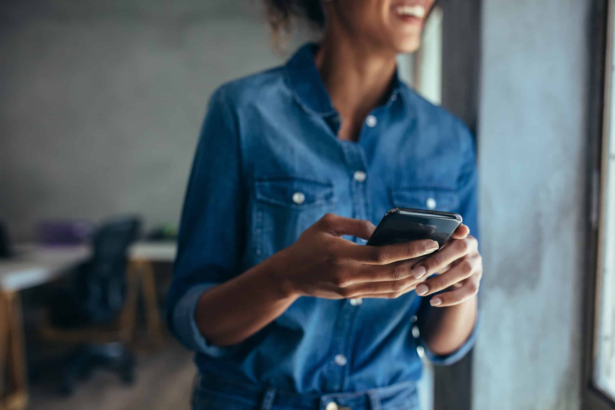Woman using mobile technology