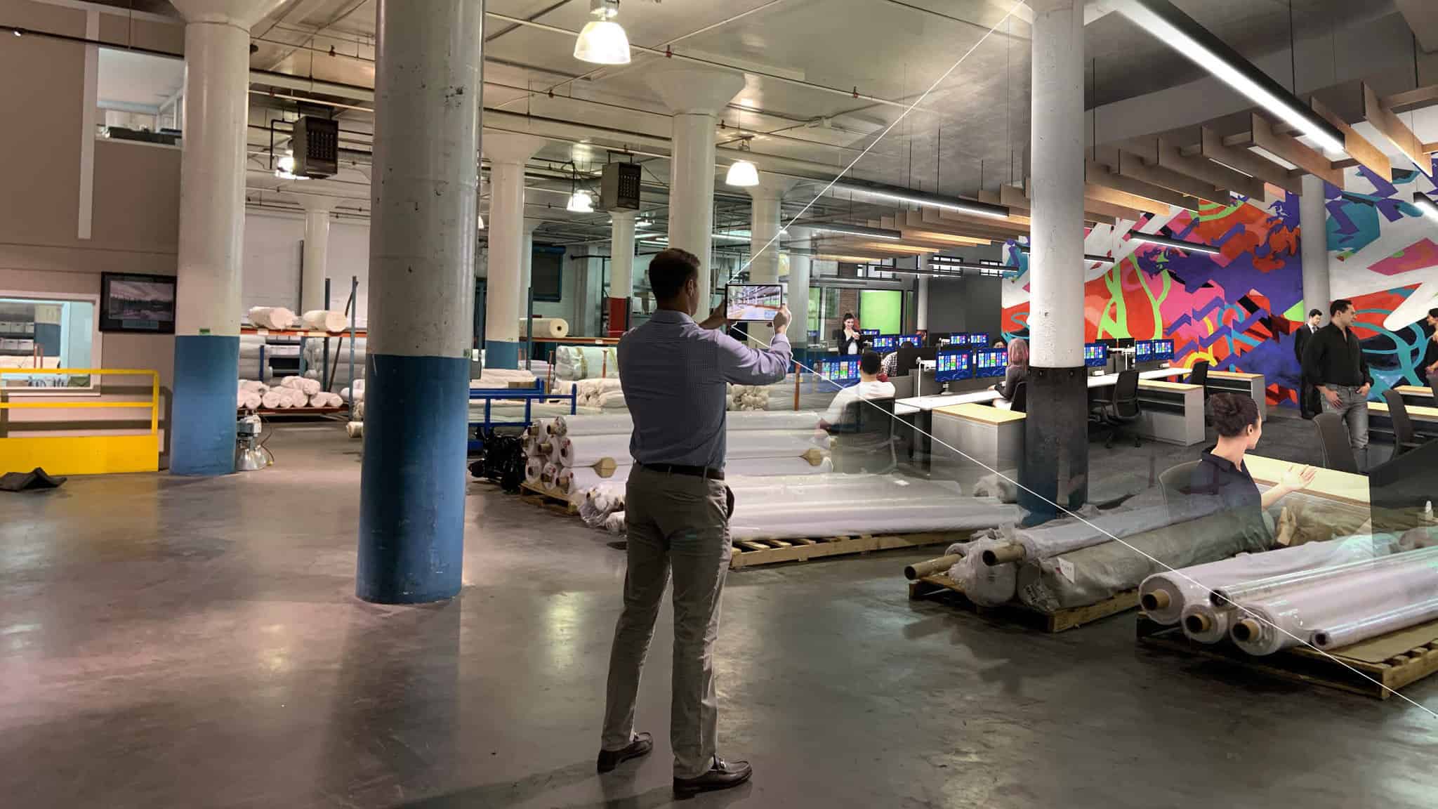 Man using virtual reality to visualize an unbuilt construction space.